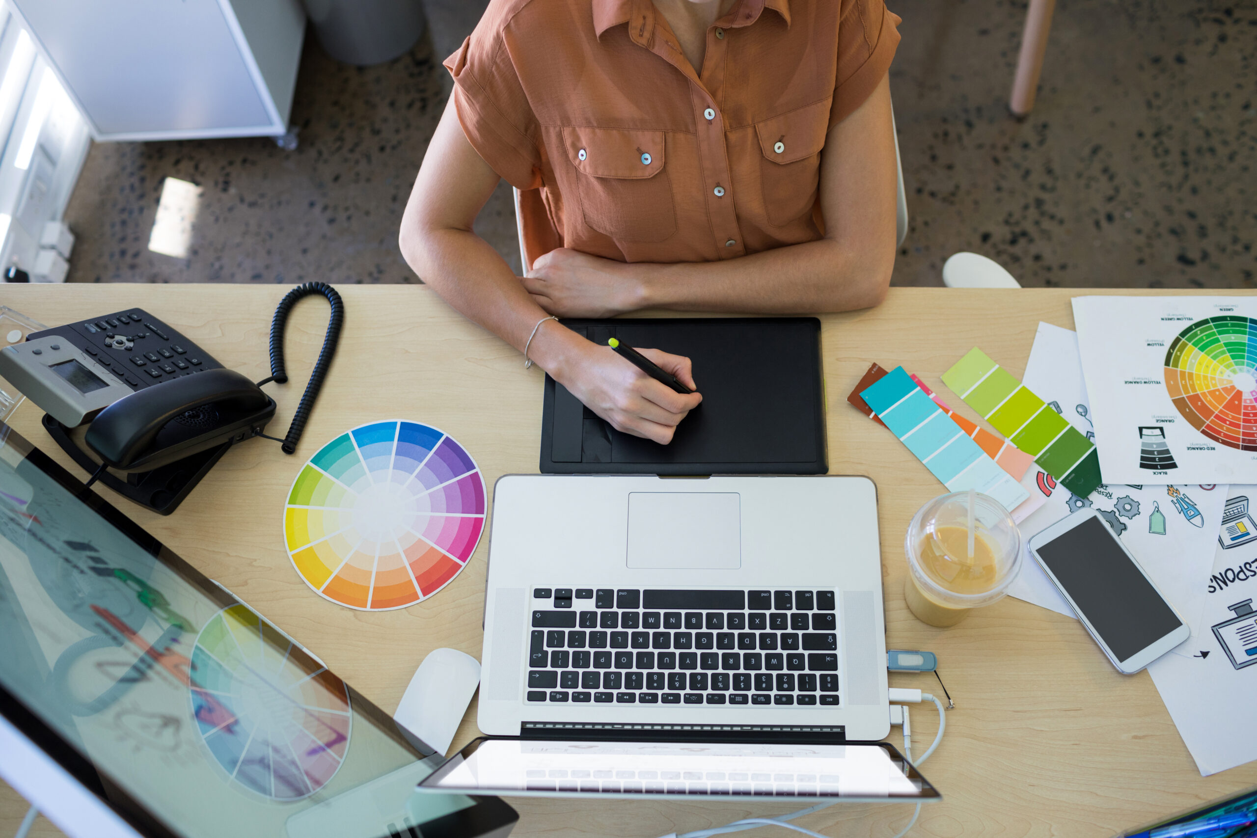 female-executive-working-over-graphic-tablet-at-he-2026-01-11-10-31-40-utc
